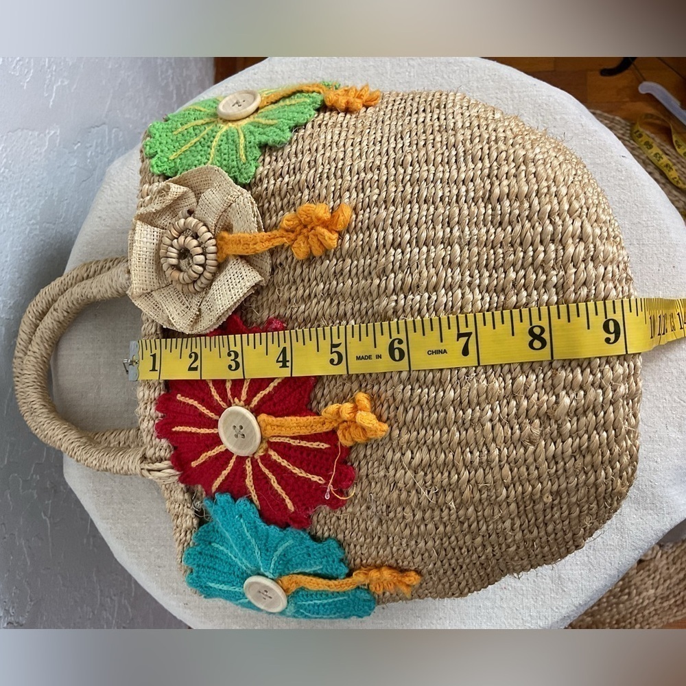 Women’s Tightly Woven Rattan Hand Bag with Crocheted Colorful Flowers - Picture 9 of 13